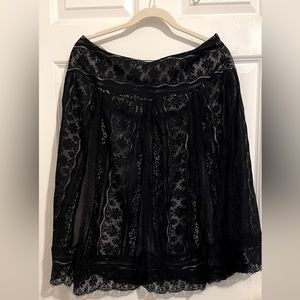 Beautiful Size 10 skirt knee length 26 width 18 with side zipper. Black Lace